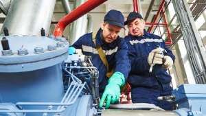 img technicians inspecting compressor 53237632729